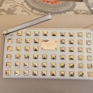 white Saffiano leather gold studded Wristlet